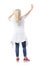 Rear view of mid age woman with raised hands lifting or holding invisible wall or ceiling