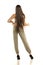 Rear view od a young woman in trousers and long hair standing on a white