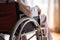 Rear view of an older patient sitting in wheelchair