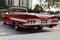 Rear view of a red colored 1960 Chevrolet Impala