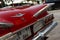 Rear view of a red colored 1960 Chevrolet Impala