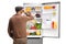 Rear view shot of an elderly man looking at an open fridge with food