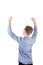 Rear view of successful student boy teenager raising hands up isolated over white background. Adolescent guy celebrate victory as