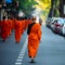 Rear View of Thai Monk Walking Down the Street