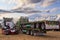 Rear view of two big rig trucks at truck show