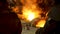 Rear view of two steelmakers at ingot casting shaking hands in front of electric arc furnace in hot shop, metallurgical