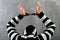 Rear view of unidentified prisoner in prison stripped uniform st