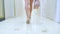 Rear view. unrecognizable beautiful blonde in a short skirt walks down the hall