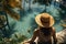 Rear view of woman in hat standing on side of swimming pool