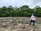 Rear view of woman at the mud volcano in Tabin wildlife