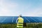 Rear view of worker at solar farm. Solar photovoltaic panels. Eco Alternative energy concept