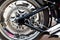 Rear wheel detail of motorcycle with brake pads