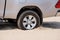 Rear wheels of a truck stuck in sand