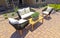 Rear Yard Patio With Wicker Sofa And Chairs On Pavers