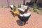 Rear Yard Wicker Furniture & Wooden Table On Pavers