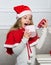 Reason children love christmas. Girl celebrate christmas open gift box. Santa bring her gift. Unpacking christmas gift