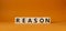 Reason symbol. Concept word Reason on wooden cubes. Beautiful orange background. Business and Reason concept. Copy space
