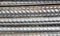 Rebar background Texture.Stainless Steel TMT Bar.Steel rebar.Steel rebar background in a construction site.