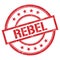 REBEL text written on red vintage stamp