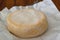 Reblochon is a soft washed-rind and smear-ripened French cheese made in the Alpine region of Savoie from raw cow`s milk.