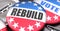 Rebuild and elections in the USA, pictured as pin-back buttons with American flag colors, words Rebuild and vote, to symbolize