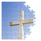 Rebuild or losing our faith - Christian cross concept image in jigsaw puzzle shape