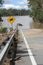 Receding Flood with Flood Debris on road on Brisbane River near Colleges Crossing 1st March 2022