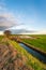 Recently cleaned ditch in a Dutch polder