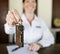 Receptionist handing room key to guest