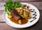 Recipe for boneless rolled chicken leg with potatoes and molasses-flavoured mache salad