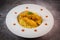 Recipe for chicken tenders with corn flakes and Italian Piombo pasta risotto and peppers