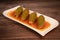 RECIPE FOR LEBANESE-STYLE MINI ZUCCHINI STUFFED WITH RICE AND BEEF IN A TOMATO SAUCE