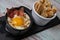 Recipe Oeuf cocotte with fresh cream sauce, Roquefort and walnuts, ham chips