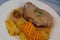 Recipe for roast pork with mustard sauce, spicy baked potato and garlic confit