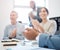 Recognise and reward exceptional work. Closeup shot of a group of businesspeople applauding together in an office.