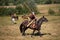 Reconstruction. Medieval armored knight with lance on horse from fantasy. Equestrian soldier in historical costume