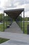 Recreation area with a canopy and benches.