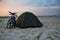 Recreation of a biker on the beach in a tent.