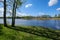 recreation camping area by the blue lake in sunny summer day