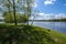 recreation camping area by the blue lake in sunny summer day