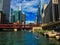 Recreation on the Chicago River, including kayaking, pedestrian walkway, fishing piers, surrounded by