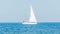 Recreation yacht, ship sailing on Black Sea, blue water, sunny day and clear sky.