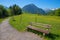 Recreational area with bench near Oberstdorf, Moorweiher pond, sunny landscape allgau