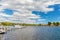 Recreational boats in front of a small swedish island with old w