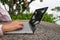 Recreational entrepreneur. Man with laptop in the morning on the beach working