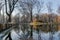 The recreational lake in the Roman park reflecting the colors of autumn, Romania