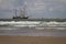 .Recreational sailors Three masted sailors sail on the North Sea close to the coast