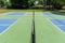 Recreational sport of pickleball court in Michigan, USA looking at an empty blue and green new court at a outdoor park. Middle