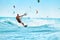 Recreational Sports. Man Kiteboarding In Sea Water. Extreme Sport Action