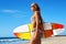 Recreational Summer Water Sports. Surfing. Girl Holding Surfboard